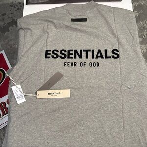 Essentials, dark oatmeal size small T-shirt